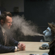 Phil gives the business to a cop played by Joel McHale.